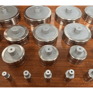 A set of cylindrical setting standards in wooden case